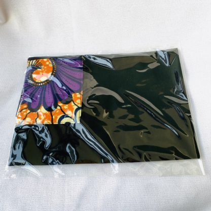 <span style="color: #ff6347; font-style: bold;">【売切】</span><br>096<br>アフリカ布のポケット付きサロン　パープル＆オレンジ