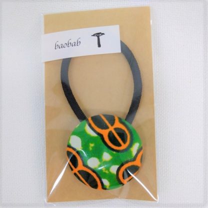 <span style="color: #ff6347; font-style: bold;">【売切】</span><br>027<br>アフリカ布の<br>ヘアゴム<br>グリーン＆オレンジ