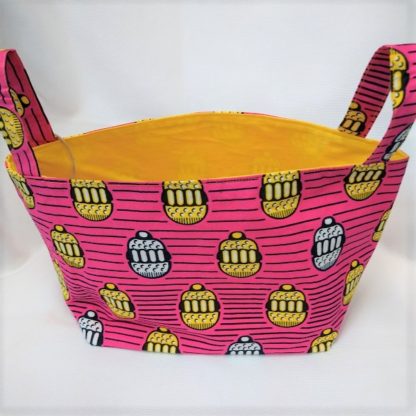 <span style="color: #ff6347; font-style: bold;">【売切】</span><br>099_アフリカ布で作った小物入れ（大）<br>ピンク＆イエロー