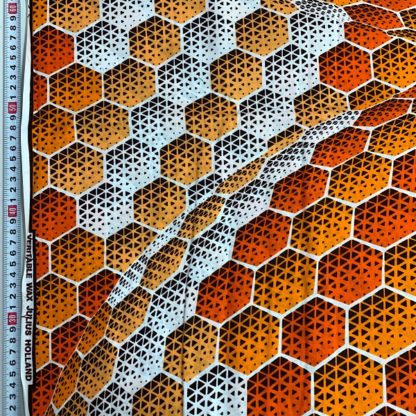 <span style="color: #ff6347; font-style: bold;">【売切】</span><br>074アフリカ布<br>オレンジヘキサゴン