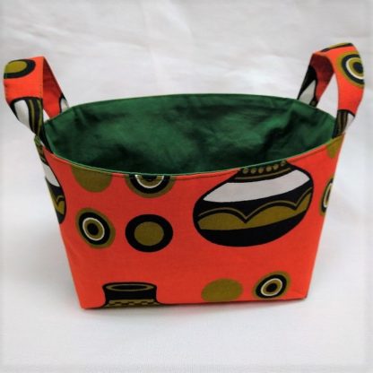 <span style="color: #ff6347; font-style: bold;">【売切】</span><br>095<br>アフリカ布で作った小物入れ（小）<br>オレンジ