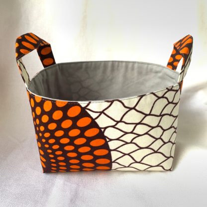 <span style="color: #ff6347; font-style: bold;">【売切】</span><br>075<br>アフリカ布で作った小物入れ（小）<br>オレンジ＆ホワイト