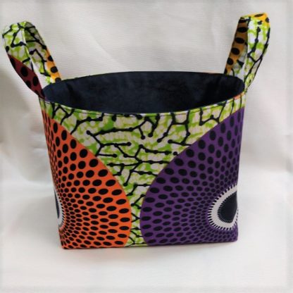 <span style="color: #ff6347; font-style: bold;">【売切】</span><br>064<br>アフリカ布で作った小物入れ（大）<br>オレンジ＆パープルサークル