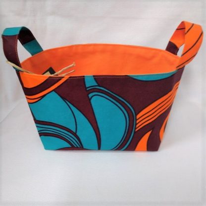 <span style="color: #ff6347; font-style: bold;">【売切】</span><br>069<br>アフリカ布で作った小物入れ（小）<br>オレンジ＆グリーン