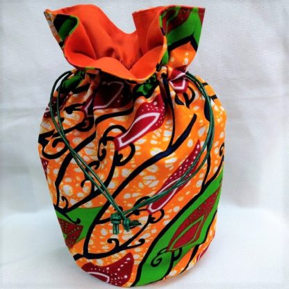 <span style="color: #ff6347; font-style: bold;">【売切】</span><br>096<br>ハネ付き丸底巾着<br>オレンジ＆グリーン➁