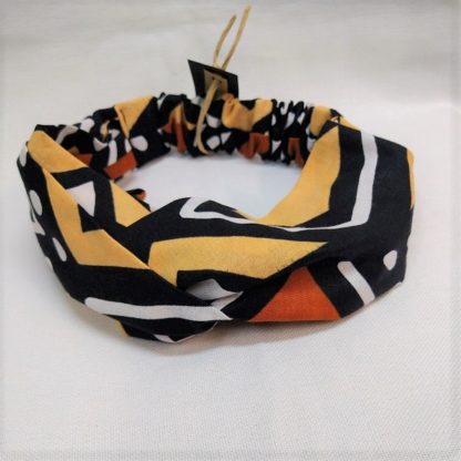 <span style="color: #ff6347; font-style: bold;">【売切】</span><br>061<br>アフリカ布の<br>ヘアバンド<br>ブラウン＆ホワイト