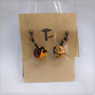 <span style="color: #ff6347; font-style: bold;">【売切】</span><br>078<br>アフリカ布の<br>イヤリング<br>ダークイエロー