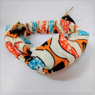 <span style="color: #ff6347; font-style: bold;">【売切】</span><br>046<br>アフリカ布の<br>ヘアバンド<br>ホワイト＆オレンジ