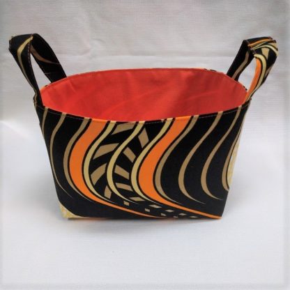 <span style="color: #ff6347; font-style: bold;">【売切】</span><br>183<br>アフリカ布で作った小物入れ（小）<br>オレンジ＆ブラウン