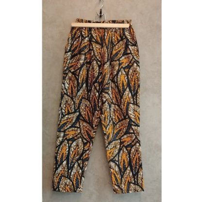 <span style="color: #ff6347; font-style: bold;">【売切】</span><br>085<br>アフリカ布の<br>タックパンツ<br>ハーベスト