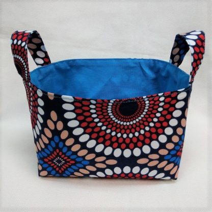 <span style="color: #ff6347; font-style: bold;">【売切】</span><br>158<br>アフリカ布で作った小物入れ（小）<br>ブルー＆レッドサークル