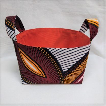 <span style="color: #ff6347; font-style: bold;">【売切】</span><br>142<br>アフリカ布で作った小物入れ（小）<br>レッド＆オレンジ
