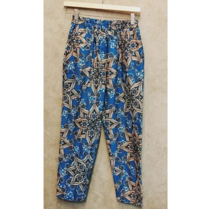 <span style="color: #ff6347; font-style: bold;">【売切】</span><br>068<br>アフリカ布の<br>タックパンツ<br>blue