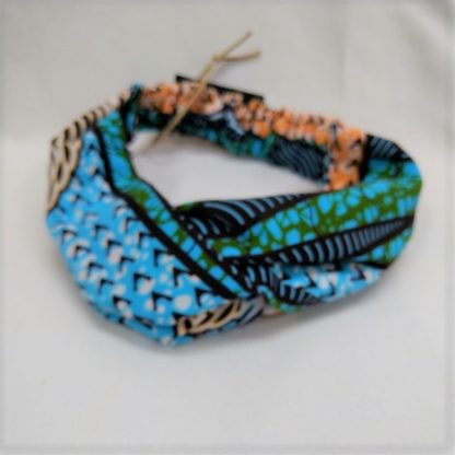 <span style="color: #ff6347; font-style: bold;">【売切】</span><br>004<br>アフリカ布の<br>ヘアバンド<br>ブルー＆オレンジ