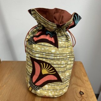 <span style="color: #ff6347; font-style: bold;">【売切】</span><br>040<br>ハネ付き丸底巾着<br>ピンク＆イエロー