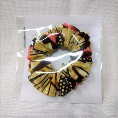 <span style="color: #ff6347; font-style: bold;">【売切】</span><br>014<br>アフリカ布の<br>シュシュ<br>pink &brown